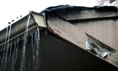 Water spouts and rotting wood on the roof decrease property value in Avon